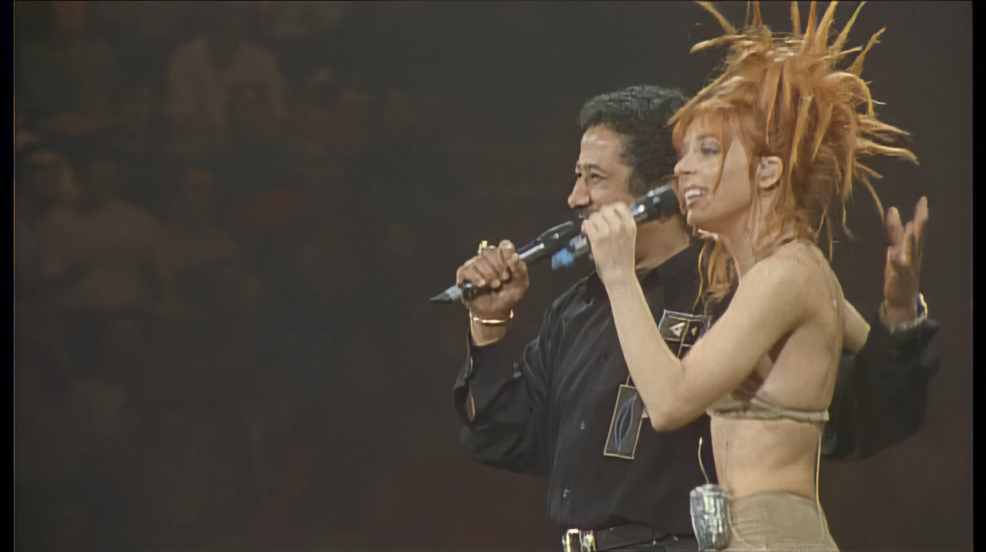 b02.Mylene Farmer - La poupe qui fait non (en duo avec Khaled) (LIVE) - 1080p.mkv_snapshot_02.19.000.png